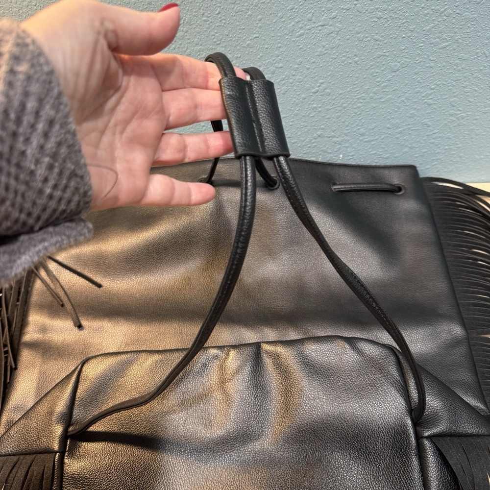 Victoria's Secret Drawstring Bag Fringe Backpack Black Faux Leather Sack NWT - Picture 4 of 11